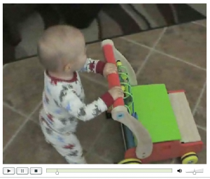 tylerwalkingbehindcart