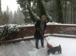 My mom shoveling snow for the second time before I got there