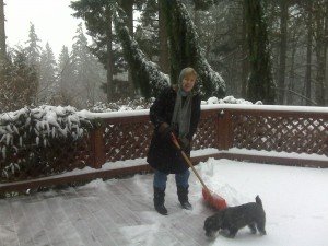 My mom shoveling snow for the second time before I got there