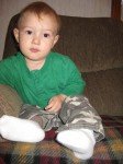 Tyler sitting on the couch